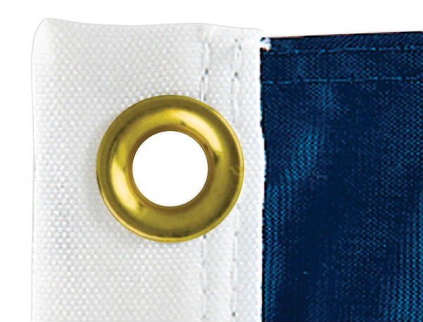 White Flag heading for sale with an example of a grommet punched into the flag header