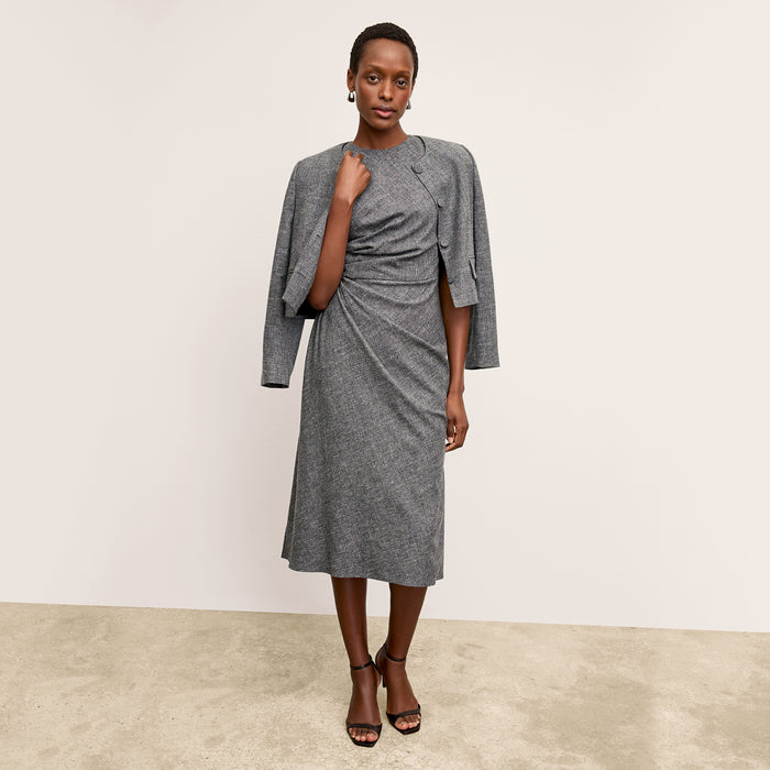 front image of a woman wearing the aniya jacket in black/white
