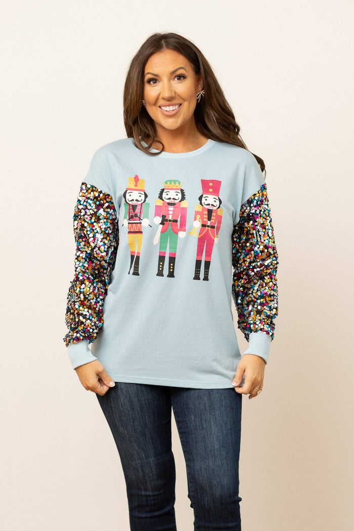 Nutcrackers on Blue Top with Sequin Sleeves