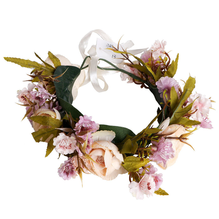rose flower crown to adorn your hair has peach and lavender colored roses and flowers, ties with a pale yellow ribbon