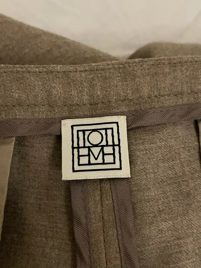 Toteme-ullkostymbyxor