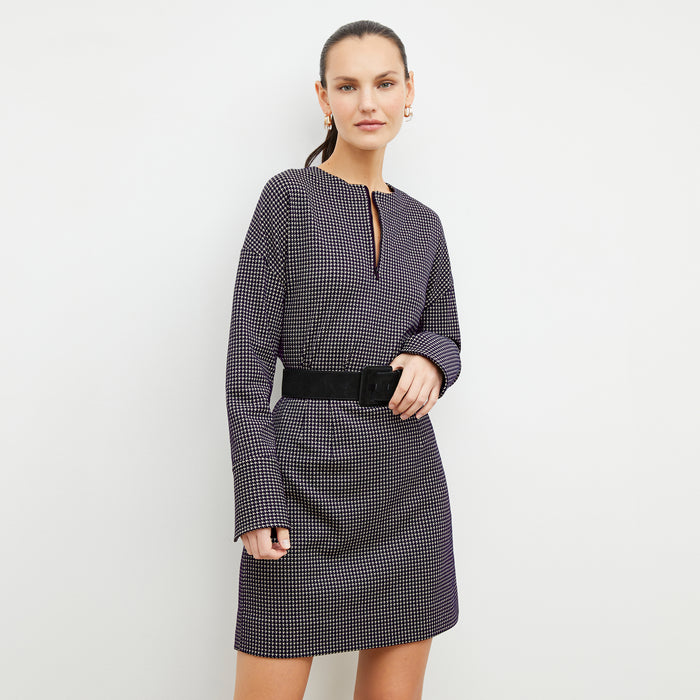 Front image of a woman wearing the tully top in black and white