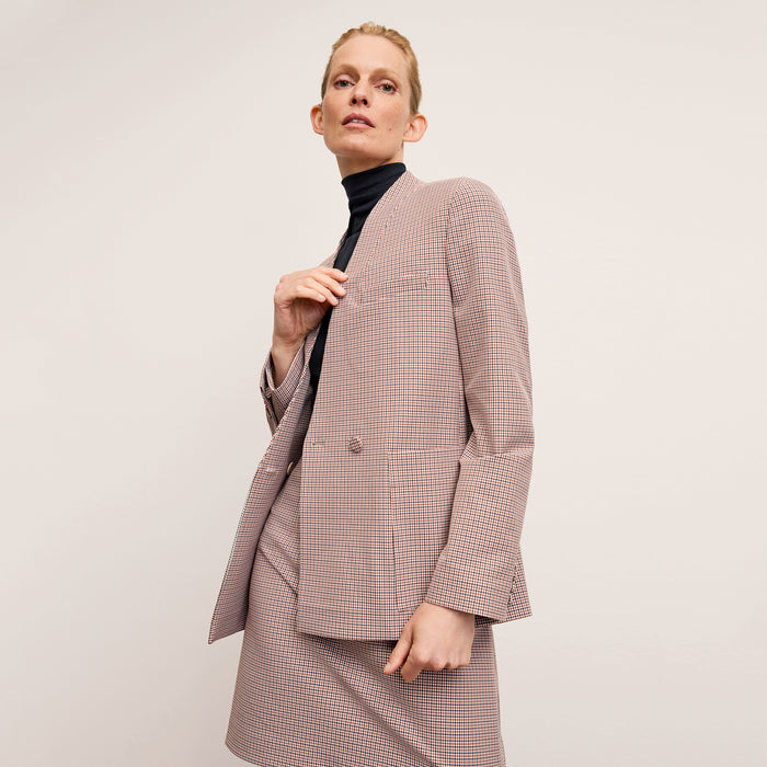 Front image of a woman wearing the Whitney Skirt in Stretch Twill in Mini Check | Exclude