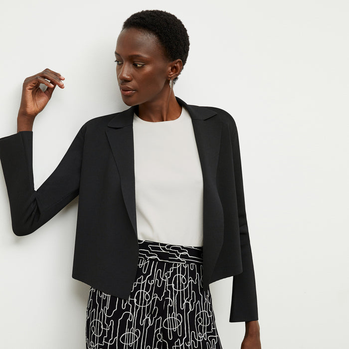 front image of a woman wearing the zhou culotte in symphony print